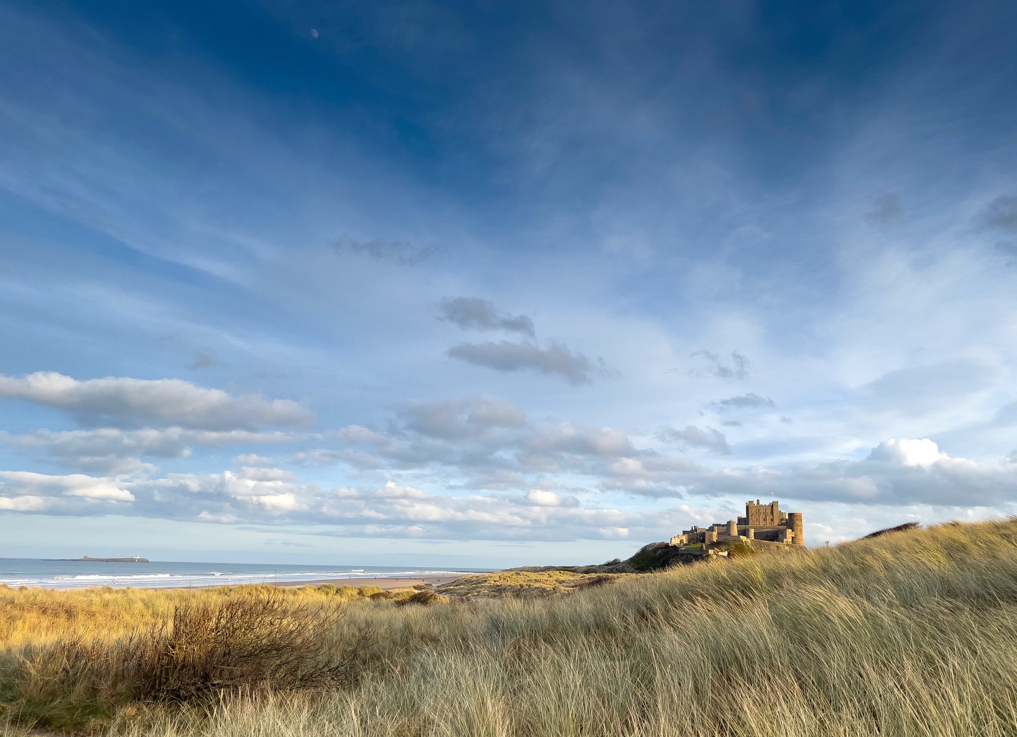 Bamburgh Castle across the dunes
