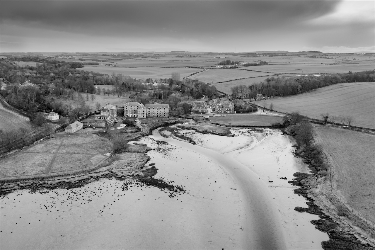 black and white aerial view of Waren Mill village