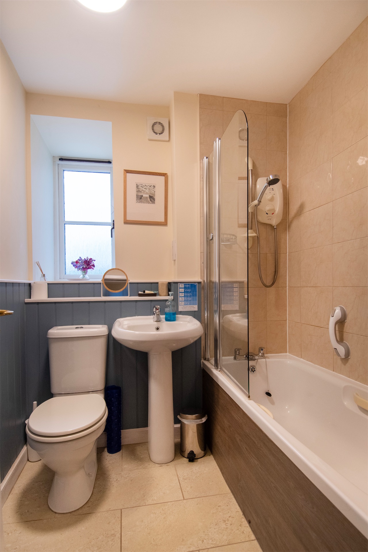 BayView family bathroom with shower over and underfloor heating
