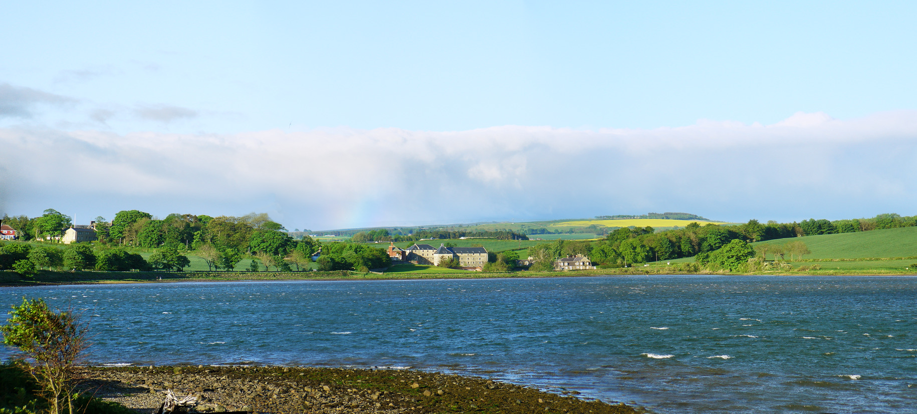 Waren Mill viewed across Budle Bay at high tide